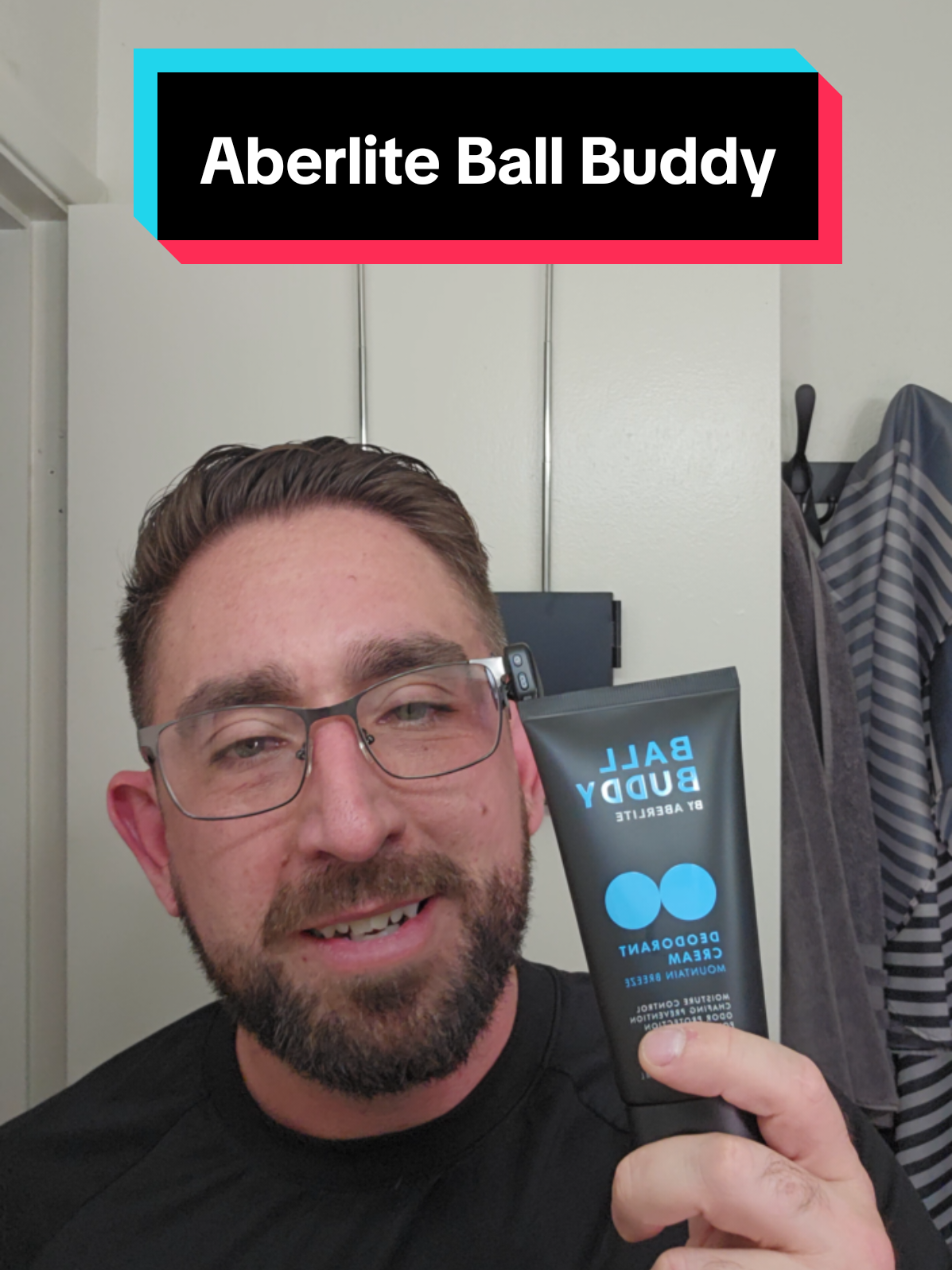 Loren Noble holding an Aberlite Ball Buddy grooming product