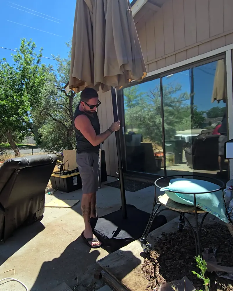 Yaheetech 16-foot patio umbrella installed outdoors